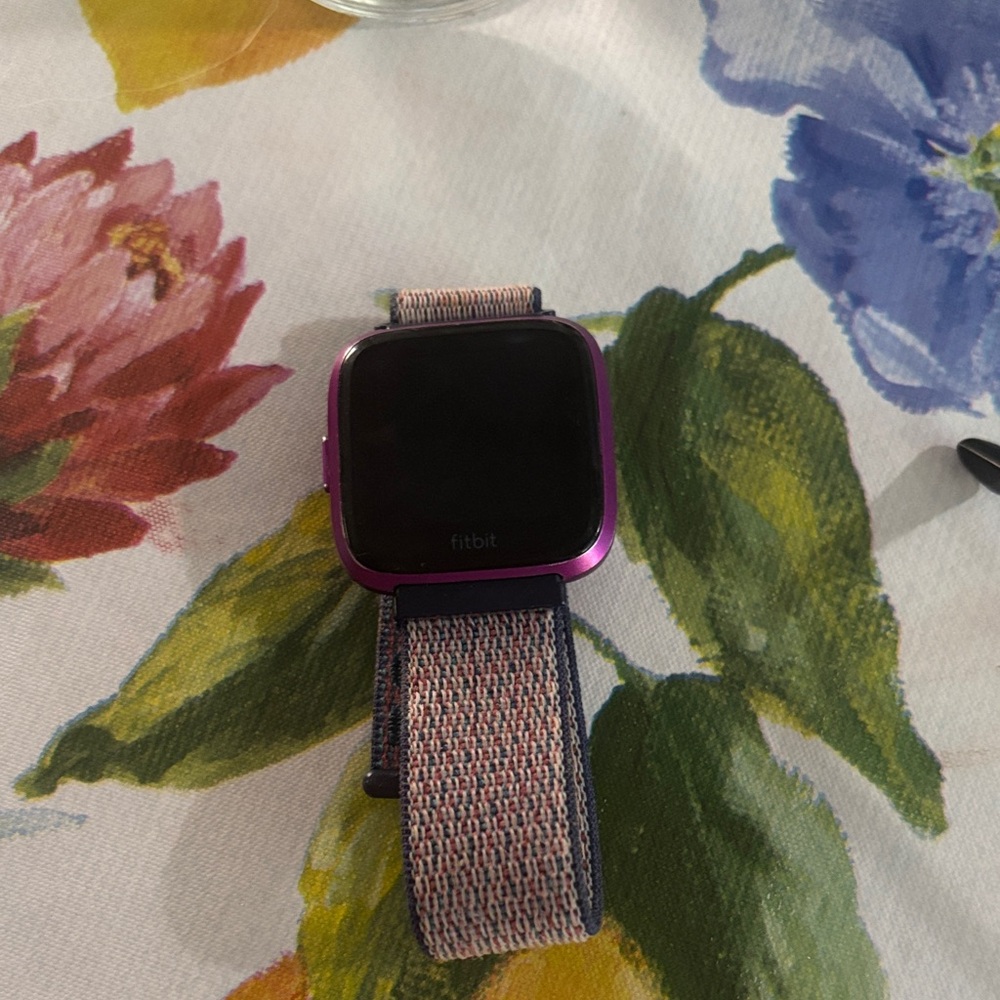 Fitbit Smartwatch with Purple Frame and Multicolor Band